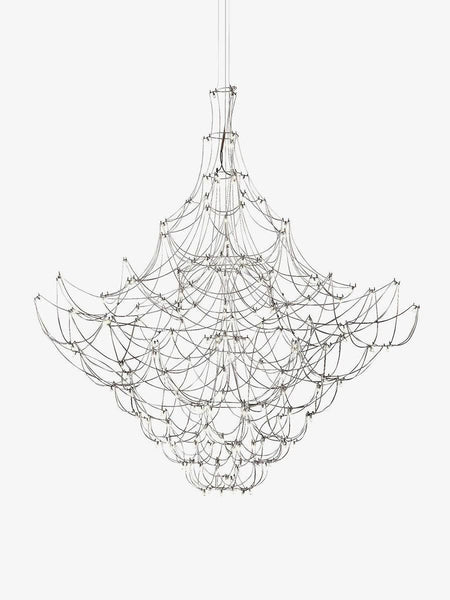 Silver Constellation chandelier hanging in a hotel lobby