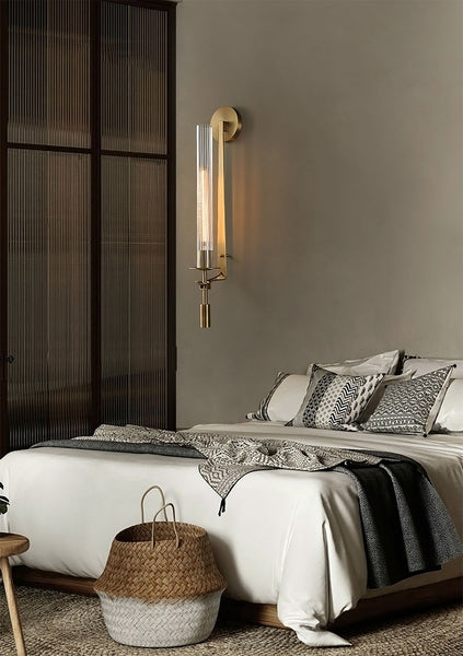 Brass vintage wall light illuminated with warm glow