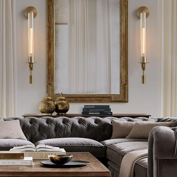 Brass vintage wall light shown from a side angle