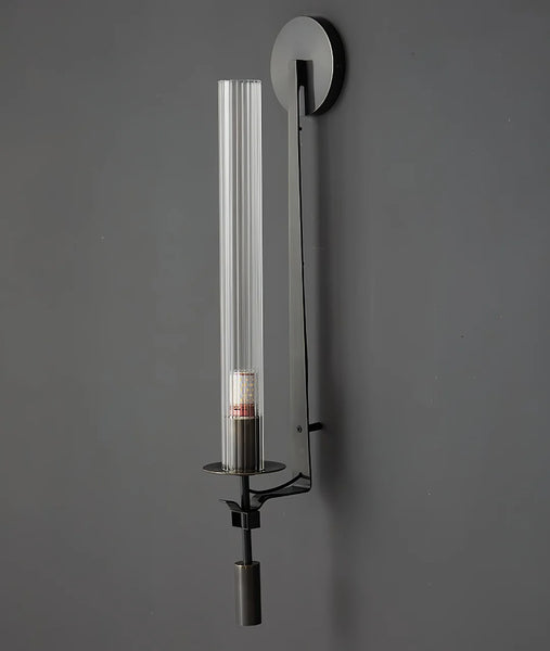 Black vintage wall light in a bedroom setting