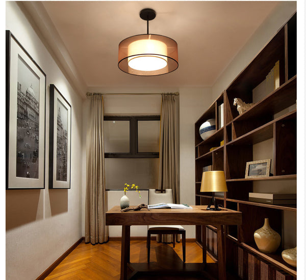 Vonluce drum light illuminated in a bedroom
