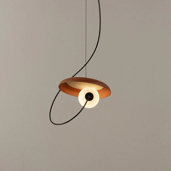 Close-up of Flos Droplight showing red glass shade