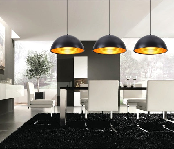 Bowling Drop Light illuminated above a dining table in Nigeria