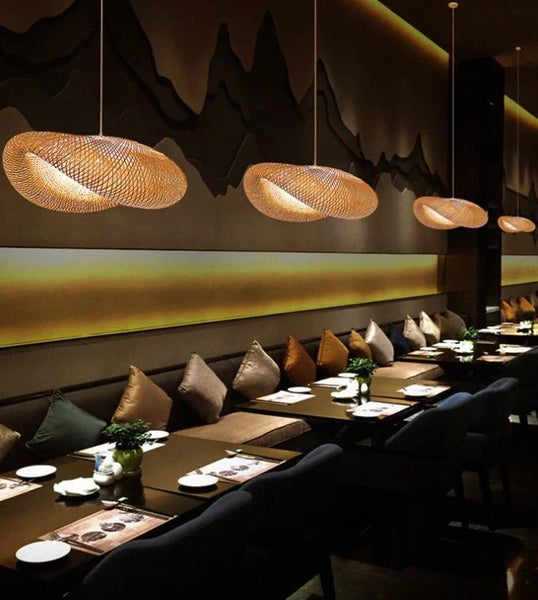 Rattan doughnut light illuminated in a restaurant setting