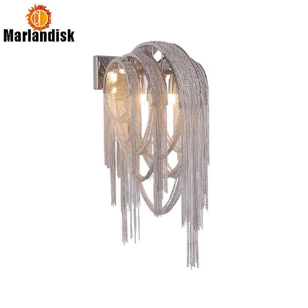 Close-up of Tassel silver wall light's Italian design