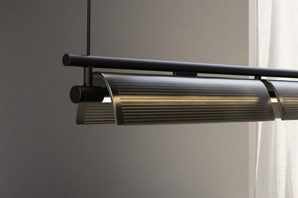 Drawns suspension light illuminated with warm white light