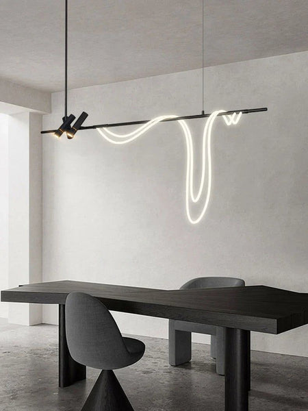 Tracer chandelier with curved dynamic silhouette