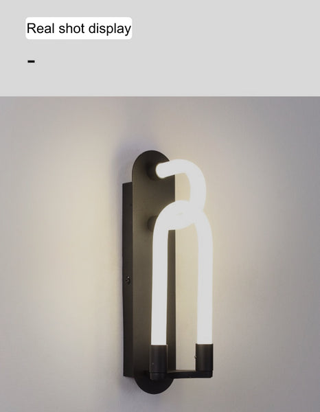Close-up of Loopi Knot wall light's unique shape