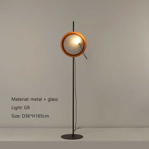 Acoustic Disc floor lamp illuminated with warm light