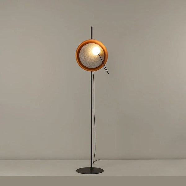 Acoustic Disc floor lamp standing in a living room