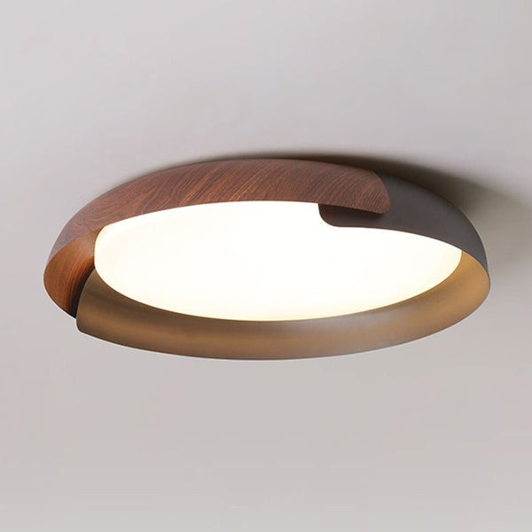 Quinn ceiling light illuminated in warm light