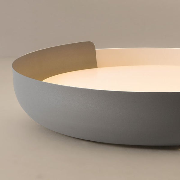 Close-up of Quinn ceiling light's white and wood finish