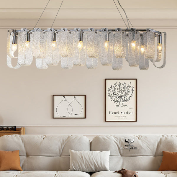 Murano long chandelier illuminated in a dining room