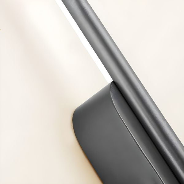 Linear black wall light in a study room