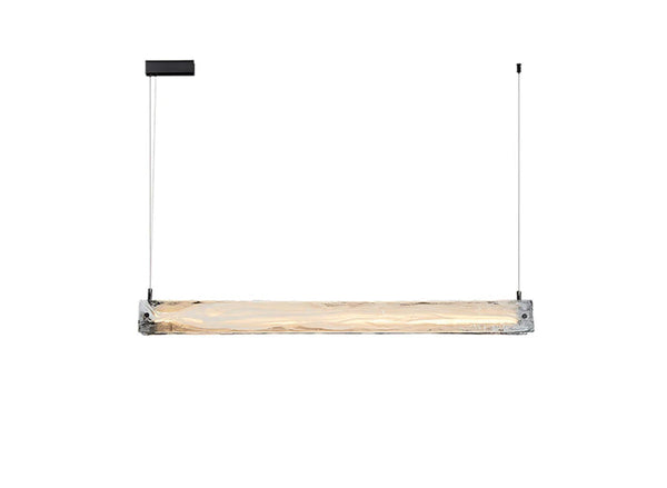 Italian marble suspension light hanging in a dining room