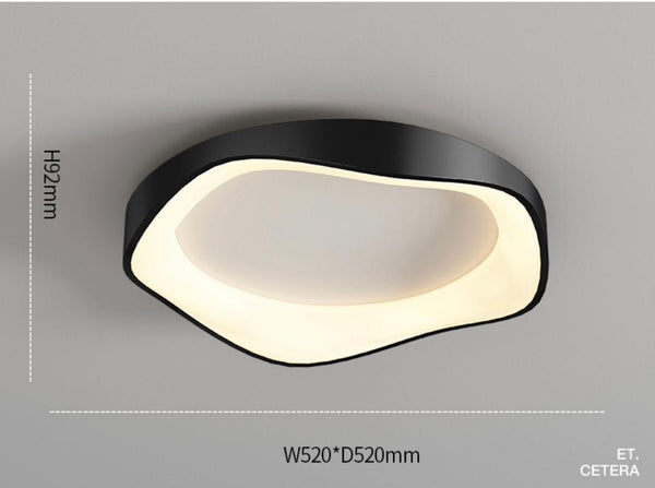 Close-up of Poly ceiling light showing irregular acrylic shade