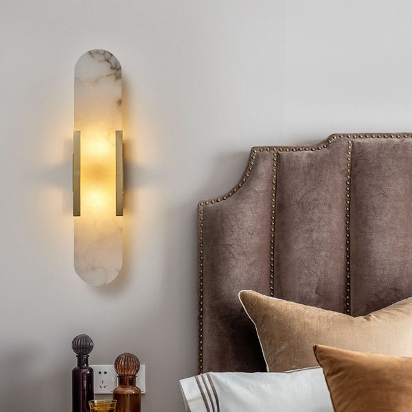 Oval Marble Wall Light mounted on a Nigerian living room wall