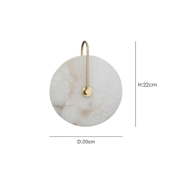 Round Marble Wall Light mounted on a Nigerian living room wall