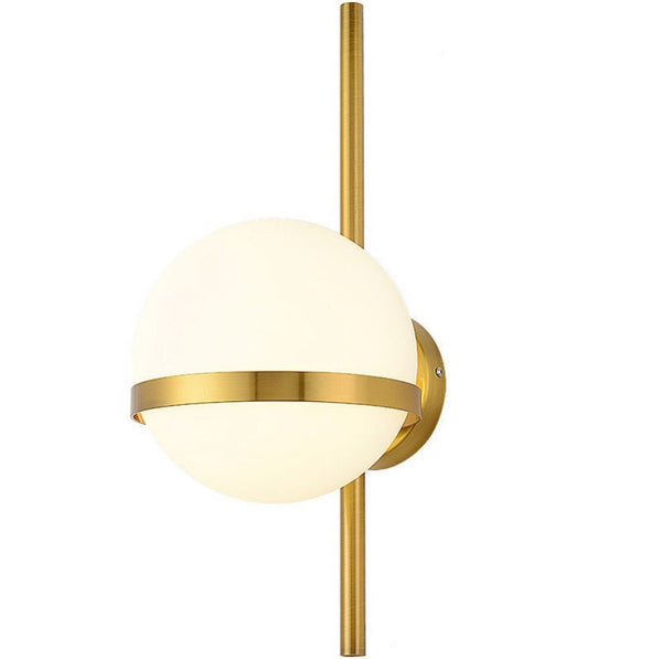 Dune Wall Light in gold mounted on a Nigerian living room wall