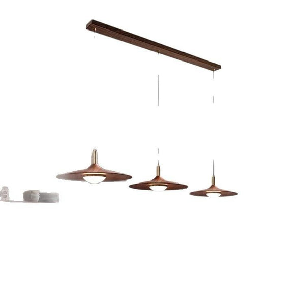 3-in-1 Scandinavian Chandelier illuminated in a Nigerian restaurant