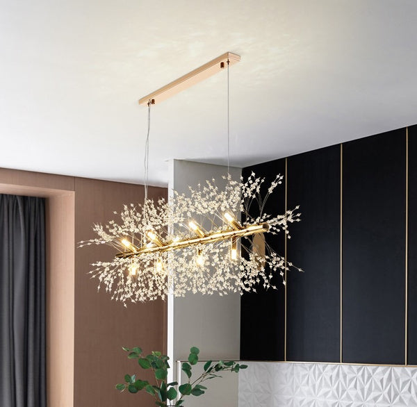 Horizontal Crystal Chandelier with cascading crystal strands above a dining table