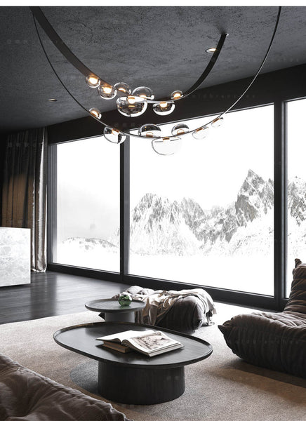Spot Belt Glass Chandelier hanging in a Nigerian living room