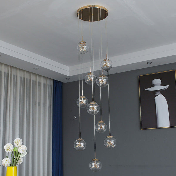 Post-Modern Gold Chandelier illuminated in a Nigerian living room