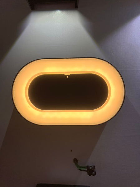 Close-up of outdoor wall light showing weatherproof fixture design