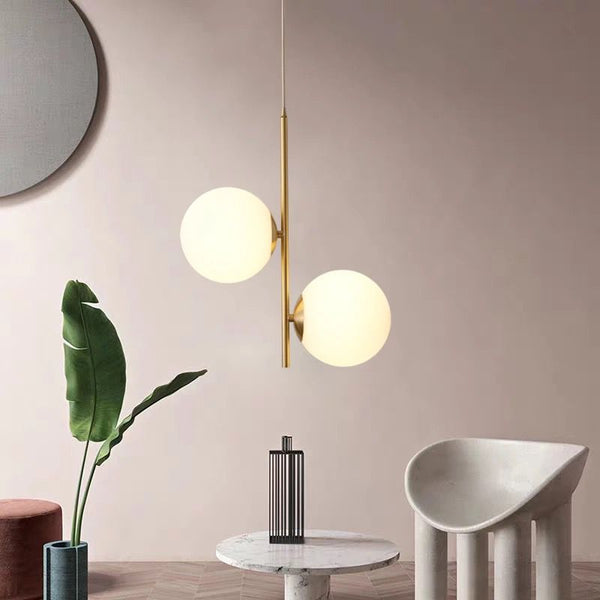 Double Moon Globe Droplight hanging in a Nigerian living room