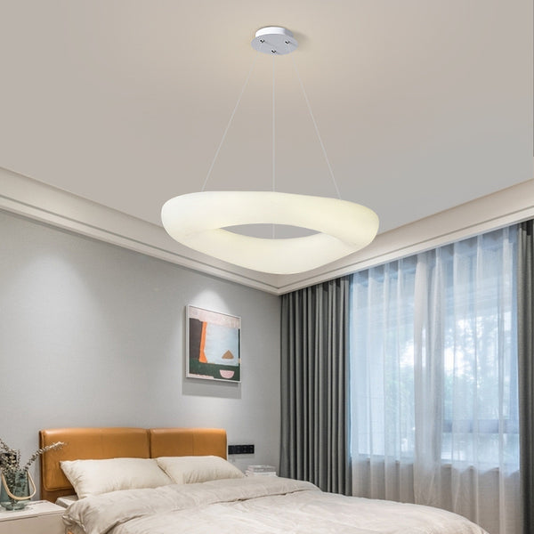 Doughnut Trichromatic LED Chandelier illuminated above a dining table in Lagos