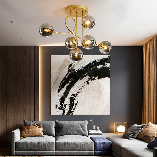Nordic Glass Luxury Chandelier in finished aluminium hanging in a Nigerian living room