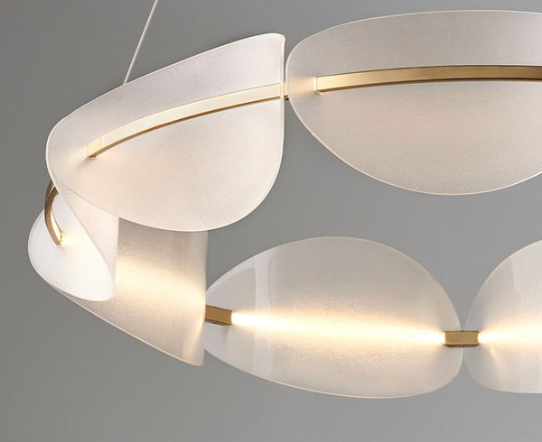 Modern LED Tricolour Chandelier illuminated above a dining table in Nigeria