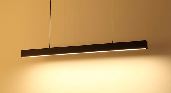 LED Long Strip Chandelier mounted above a kitchen island in Nigeria