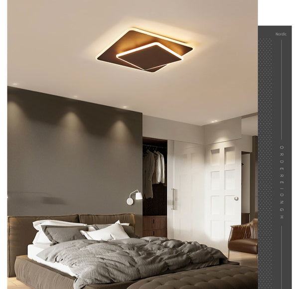 Square Modern Minimalist Ceiling Light illuminated in a Nigerian bedroom