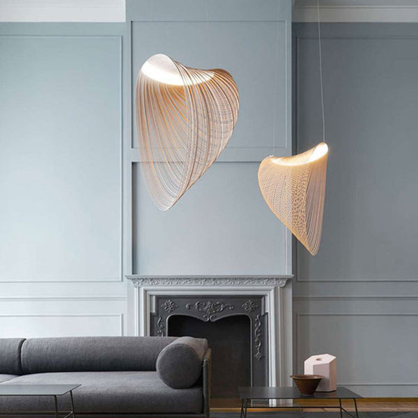 Italian Wood Stripe Chandelier illuminated above a dining table in Nigeria