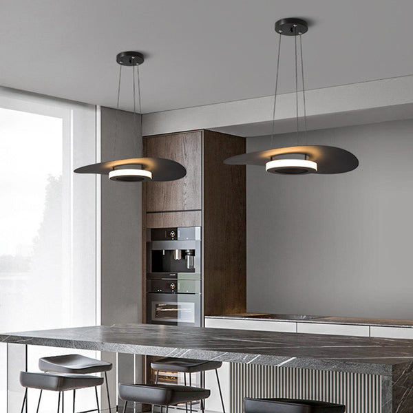 Potter Chandelier with clean minimalist frame hanging above a dining table
