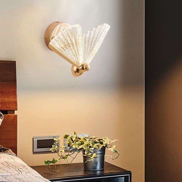 Butterfly wall light with butterfly-shaped silhouette mounted on a Nigerian wall