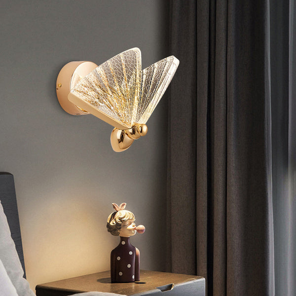 Butterfly wall sconce illuminated in a Nigerian bedroom hallway