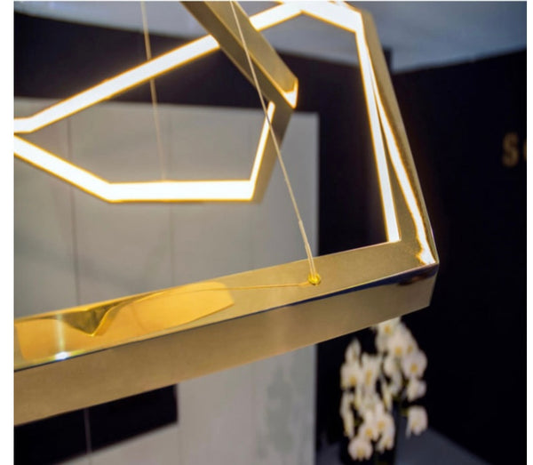 Gold Steel Trichromatic Chandelier close-up showing adjustable LED settings