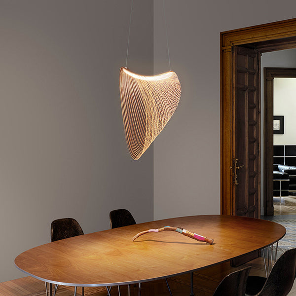 Italian Wood Stripe Chandelier hanging in a Nigerian living room
