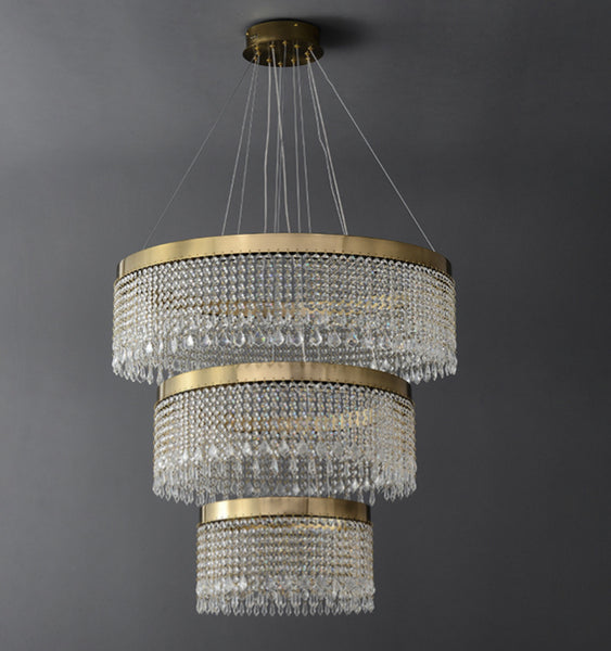 3-Step Luxury Crystal Chandelier illuminated in a Nigerian foyer