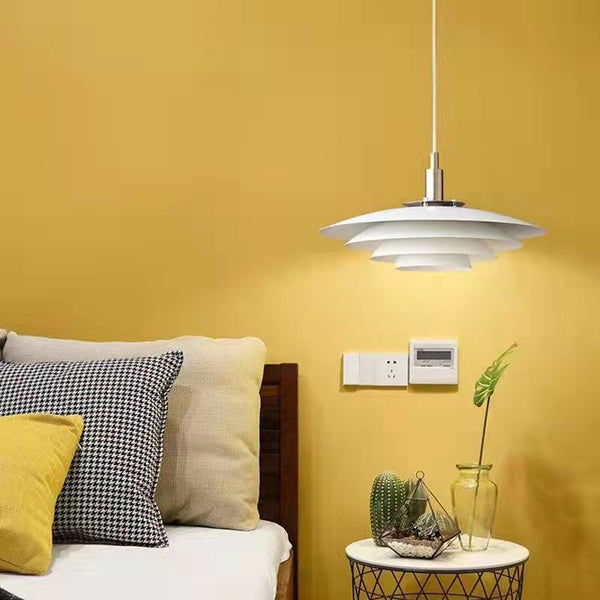 Danish Saucer Nordic Ceiling Light illuminated in a Nigerian bedroom