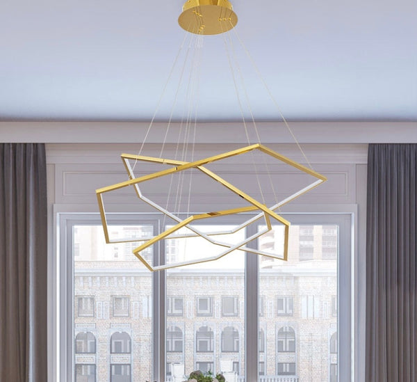 Close-up of Gold Steel Trichromatic Chandelier showing gold steel frame
