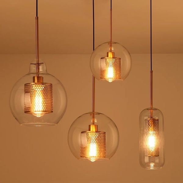 Glass Long Weavils Droplight with elongated glass shade above a dining table