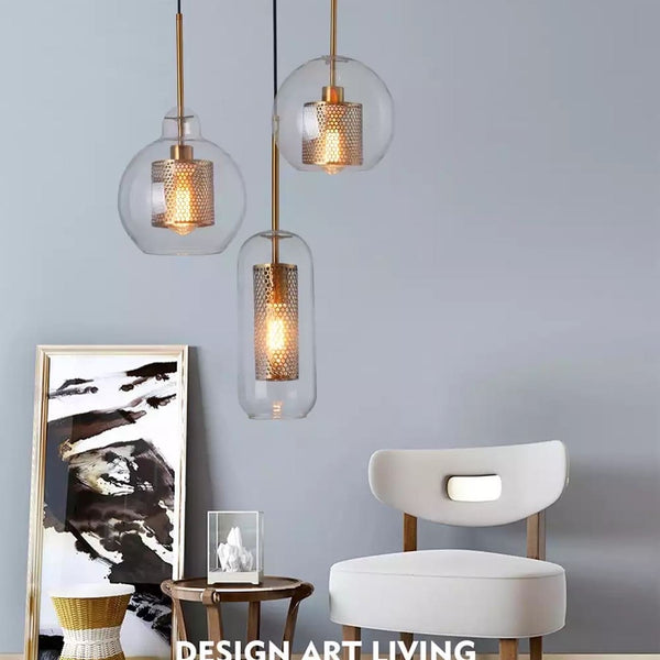 Glass Long Weavils Droplight cluster illuminated above a kitchen island