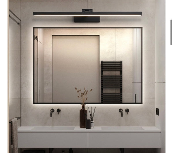 Black Mirror LED Wall Light styled in a modern Lagos hallway