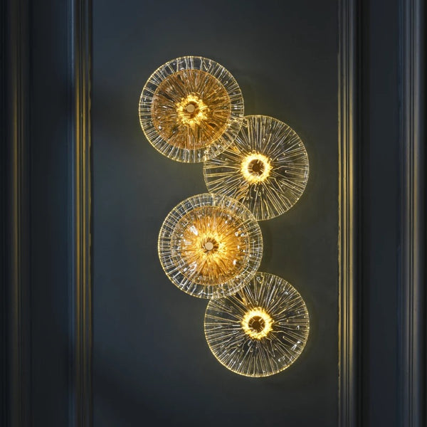 Lotus Leaf wall light with sculptural leaf-shaped gold design mounted on a Nigerian wall