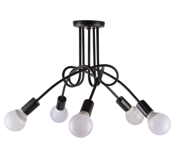 Personality Twist Droplight with spiral-twist glass shade above a dining table