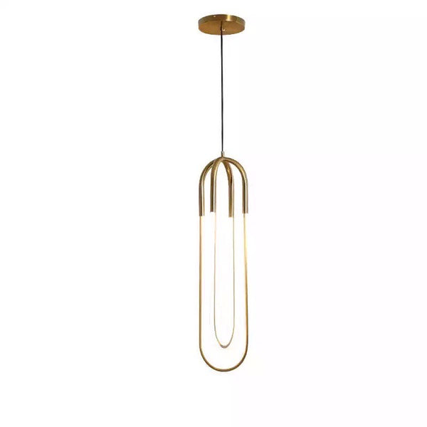 Remote U Pendant Light with U-shaped design above a Nigerian dining table