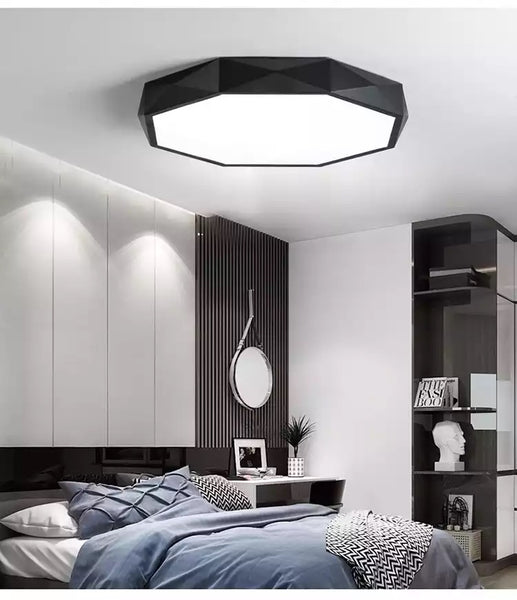 Hexagon Geometry gold LED ceiling flush light fixed to a modern Nigerian ceiling